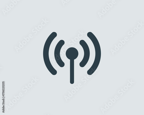Simple dark gray wifi signal icon on a light blue background