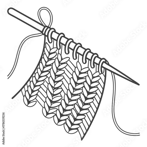 Knitting Needle with Yarn and Partially Knitted Fabric wool