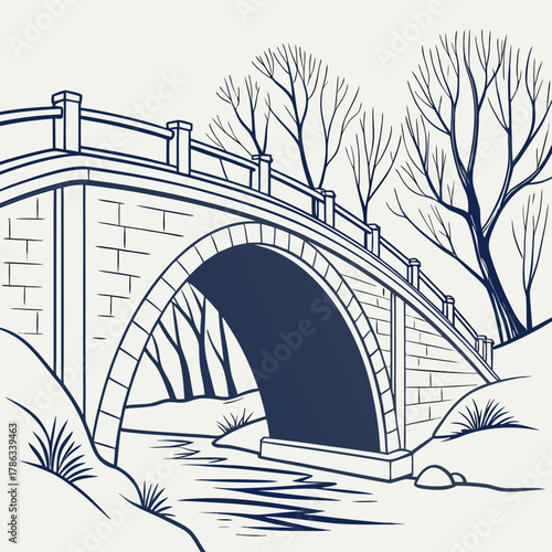 Stone Arch Bridge Over a Stream with Bare Trees in Winter Keywords: bridge, stone bridge, arch
