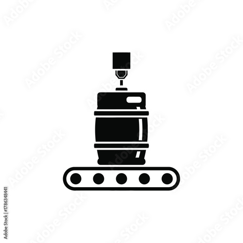 Black keg on conveyor belt with filling machine barrel