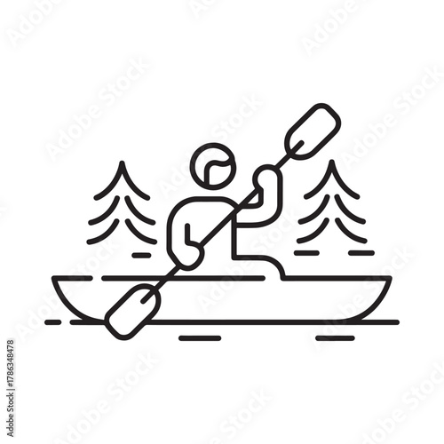 Person kayaking in a serene forest lake with trees