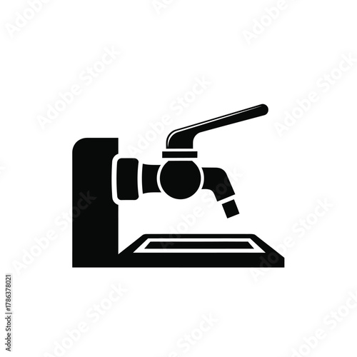 Black silhouette of a water tap with lever and basin