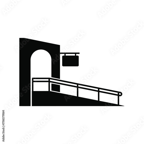 Black silhouette of building entrance with ramp and sign