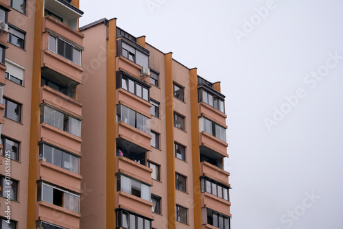 Orange apartment tower ready for maintenance inspection