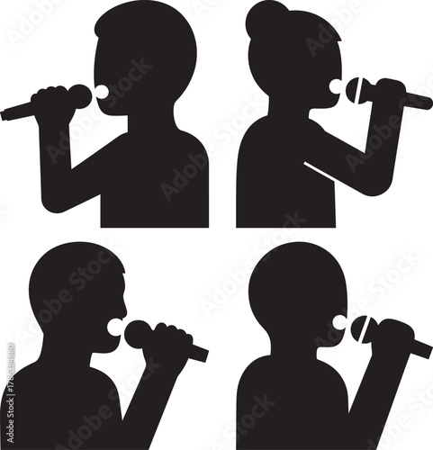 Four children singing into microphones silhouette
