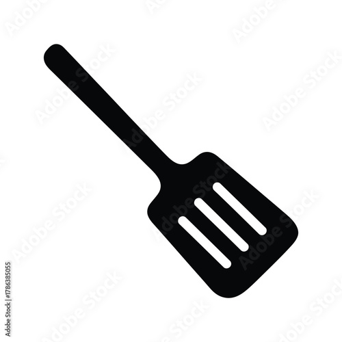 Black spatula kitchen utensil icon on white background