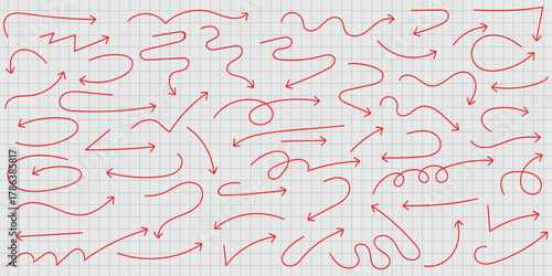 A collection of various red arrow doodles on a grid paper background with different shapes and directions