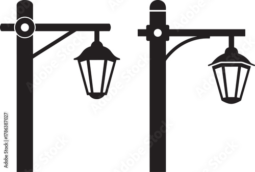 Two vintage street lamp posts silhouette