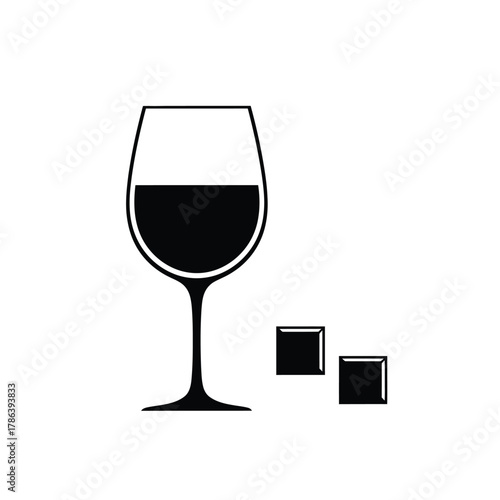 Black wine glass with dark liquid and two ice cubes