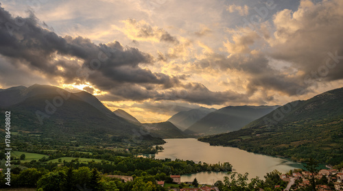 Fototapeta Naklejka Na Ścianę i Meble -  Lake Barrea is an artificial lake in the province of L'Aquila, in the Alto Sangro area; created in 1951 by damming the Sangro River near the Barrea Gorge, between the Marsicani Mountains.