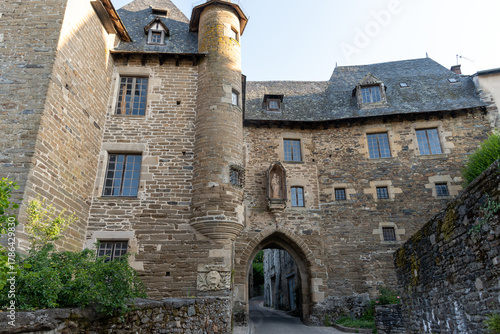 Fototapeta Naklejka Na Ścianę i Meble -  Walking in Uzerche, historical fortified royal patronage medieval town in Correse department, Nouvelle-Aquitaine, France, old houses and narrow streets