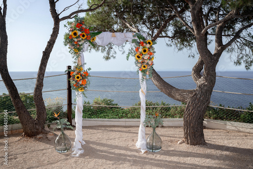 Fototapeta Naklejka Na Ścianę i Meble -  wedding arch by the adriatic sea