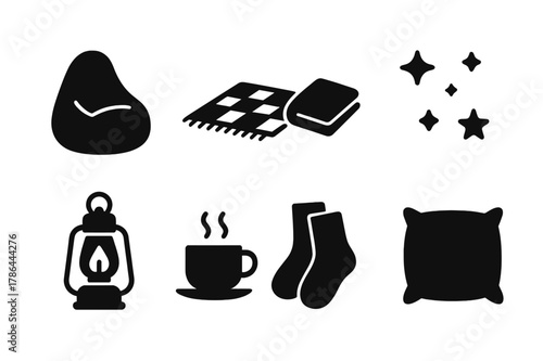 Cozy Icon Collection. Cozy setup. Filled icon set of cozy setup: bean bag chair, picnic mat, throw blanket,
