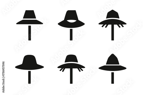 Scarecrow Hat Logos. Scarecrow hat. Set Logo of scarecrow hat: hat resting on a wooden pole top. Icon set. harmonious logo variations of the same emblematic