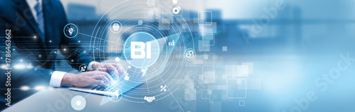 Quadro su tela Analyst using laptop to visualize BI reports, dashboards, performance insights, and data-driven decision-making analytics