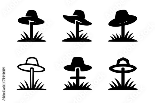 Scarecrow Hat Logos. Scarecrow hat. Set Logo of scarecrow hat: hat hung on fence post in field silhouette. Icon set. harmonious logo variations of the same