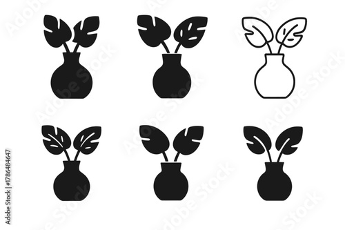 Vase Logo Variations. tabletop flower vase. Set Logo of tabletop flower vase: sculptural vase with tropical leaves. Icon set. harmonious logo variations of the