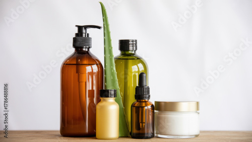 Wallpaper Mural Natural cosmetic bottles with aloe vera on wooden table. Torontodigital.ca