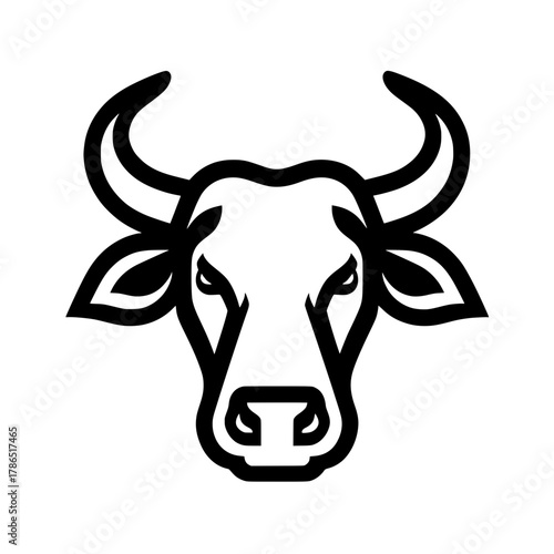 a bull or cow head with curved horns and a determined expression.