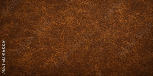 A dark brown leather texture background shows an aged, rough surface pattern with a vintage design