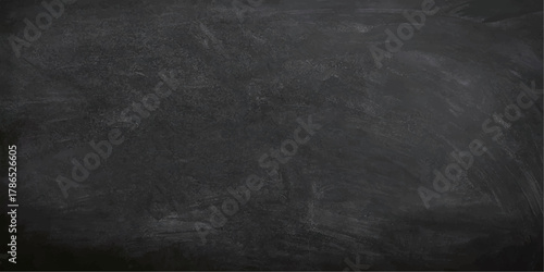 Dark blank vintage chalkboard texture backdrop with chalk grunge surface and old rough frame