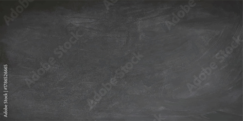 Empty black chalkboard with chalk dust texture, old rough dark surface design, and vintage grunge blackboard backdrop