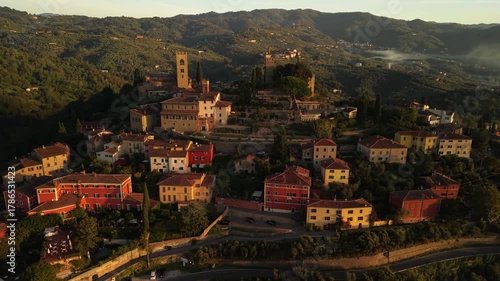 Italy, Idyllic traditional towns of romantic Tuscany. Picturesque borgo Buggiano hill top medieval village near Pienza. 4k hd drone footage in morning light
