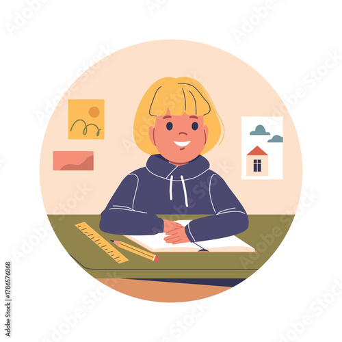 Schoolboy studying at school lesson