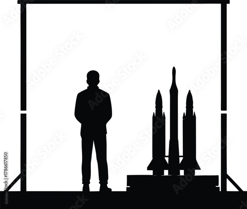 Silhouette of a person standing next to rockets isolated on white background