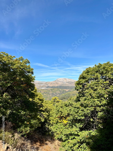 view of andalusian sierra in Spain with sea in the background, a perfect destination for hiking