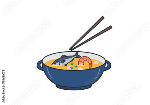 A bowl of seafood soup with chopsticks poised above it