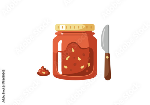Jar of reddish jam with seeds a small dollop and a butter knife