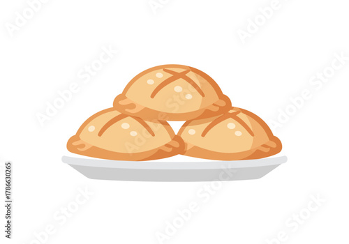 Stack of three golden baked pastries with crossshaped vents on a white plate