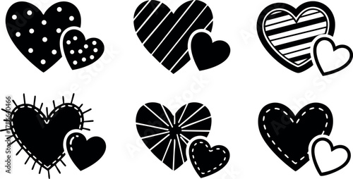 Black and white patterned hearts vector illustration with smaller hearts in pairs 