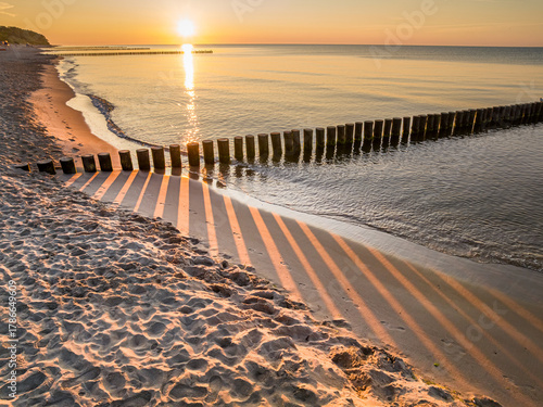 Beach and sun rays through ...