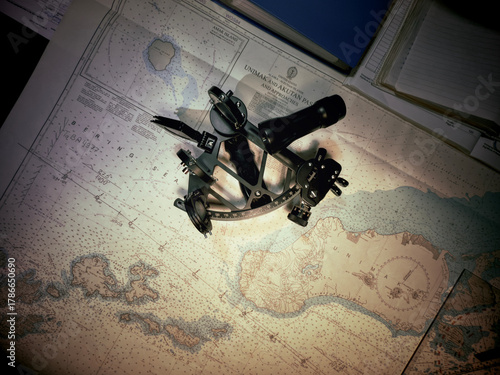 Photos Nautical chart of Unimak and Akutan Pass, Alaska, with marine sextant