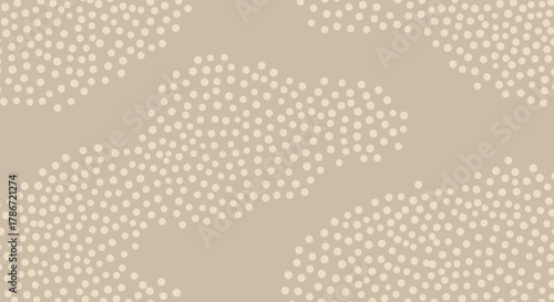 Elegant beige background with clustered dots creating a calming and minimal design