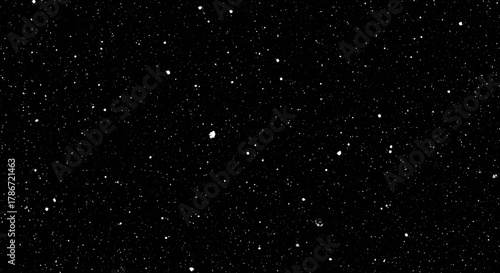 Abstract dark background with sparkling dots creating a starry night effect