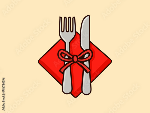 The fork and knife are tied in a red napkin
