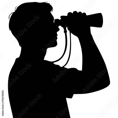 silhouette of a person using binoculars
