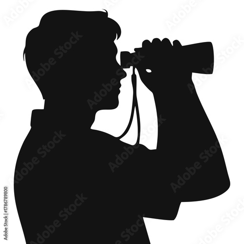 silhouette of a person using binoculars