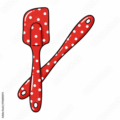 Two red spatulas with white polka dots for stirring and mixing. Red spatulas are common kitchen utensil, useful for baking, cooking, or food preparation.