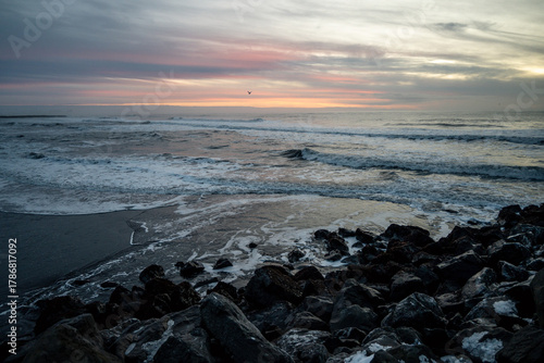 Fototapeta Naklejka Na Ścianę i Meble -  Sunset on the beach of the Baltic Sea in Kolobrzeg, Poland