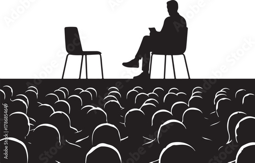  Silhouette of a speaker or interviewee on stage with an empty chair, facing an audience, representing a public speaking event, interview, or talk show.