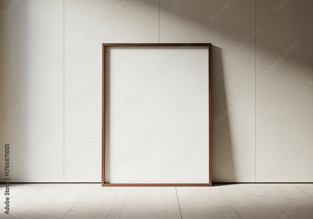 Fototapeta premium Minimalist art frame on wooden floor against a white wall interior