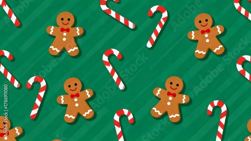Gingerbread men and candy canes on green background