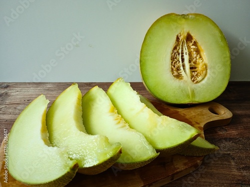 Wallpaper Mural fresh halved melon on table Torontodigital.ca