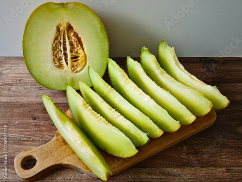 Wallpaper Mural fresh halved melon on table Torontodigital.ca