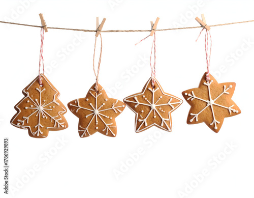 Festive Gingerbread Cookies Star, Snowflake, and Tree Shapes, Christmas Holiday Treats Hanging Isolated on White