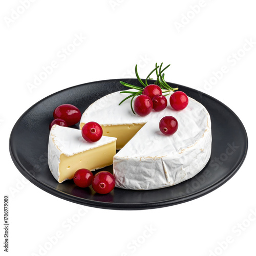 Rustic baked camembert cheese topped with cranberry sauce on a dark surface, a warm and inviting dish, cleanly isolated on white background with copy space